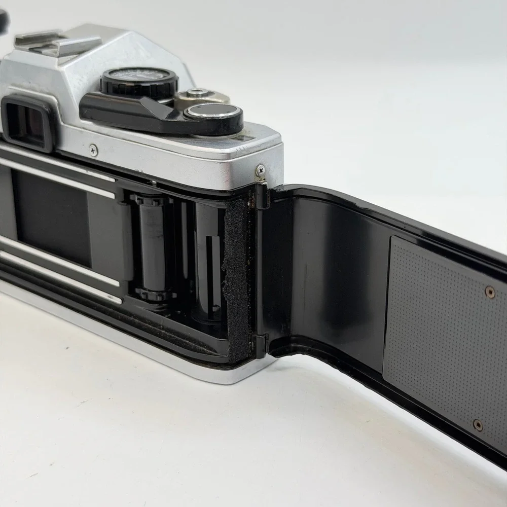 Olympus OM10 35mm Film SLR Camera Body Silver Black with Manual Adapter TESTED